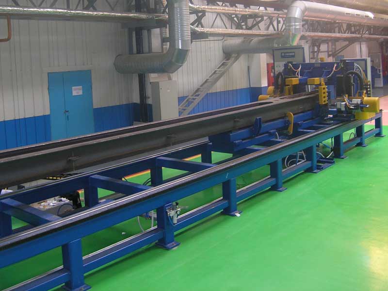 Automated center sill drilling center 