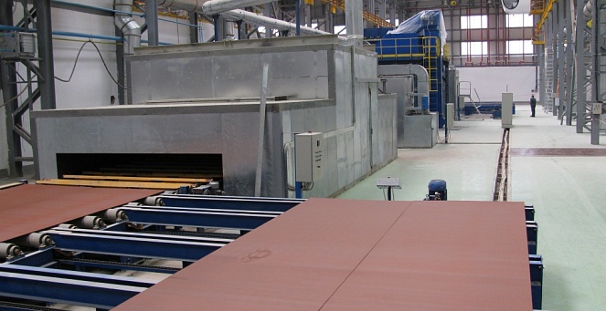 Line for shot blasting and preservation of rolled metal sheets with conductive soil